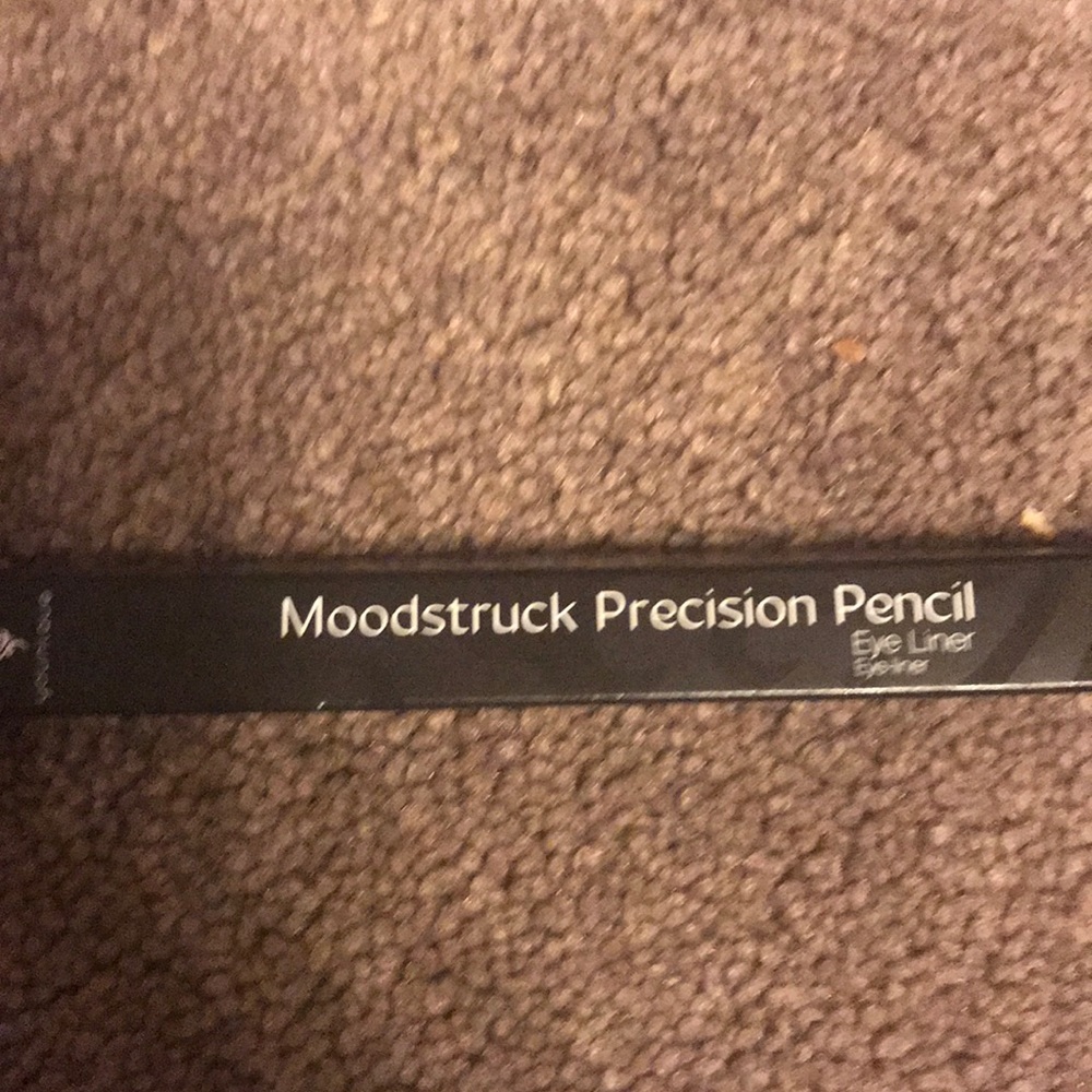 Precarious pencil eyeliner